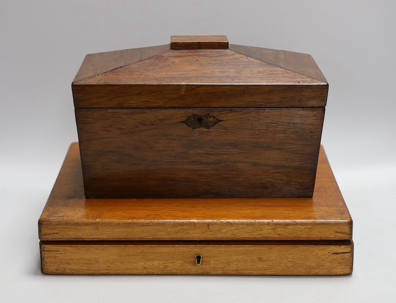 A 19th century rosewood tea caddy and a cased set of 12 plated fish servers, caddy 18cms wide x 14cms high